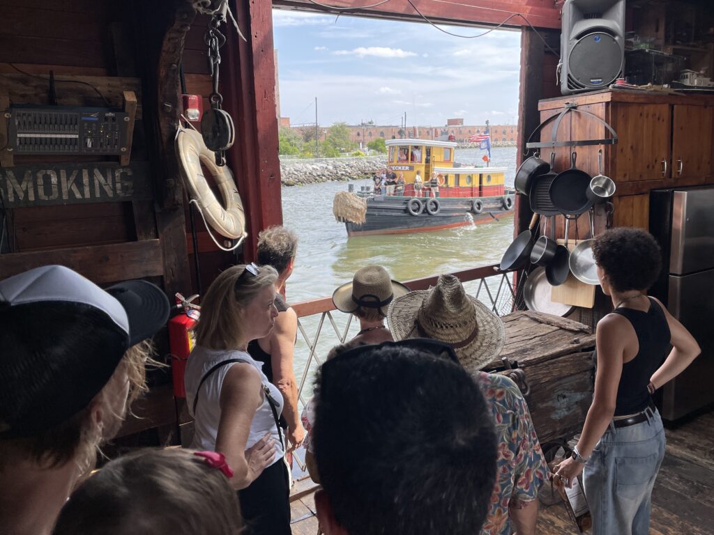 Looking through the window on the bagre as a tug approaches